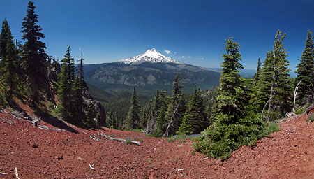 Red cinders frame Mount Hood from the east leg of the Lookout Mountain loop