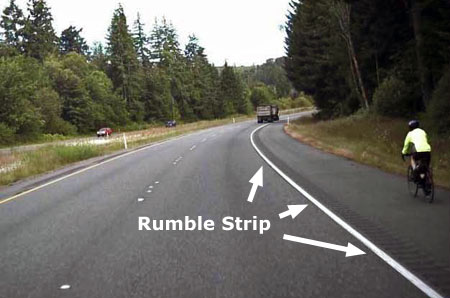 Rumble strips are very effective at keeping distracted drivers out of bike lanes, but bikes also need enough lane space to keep away from the rumble strip